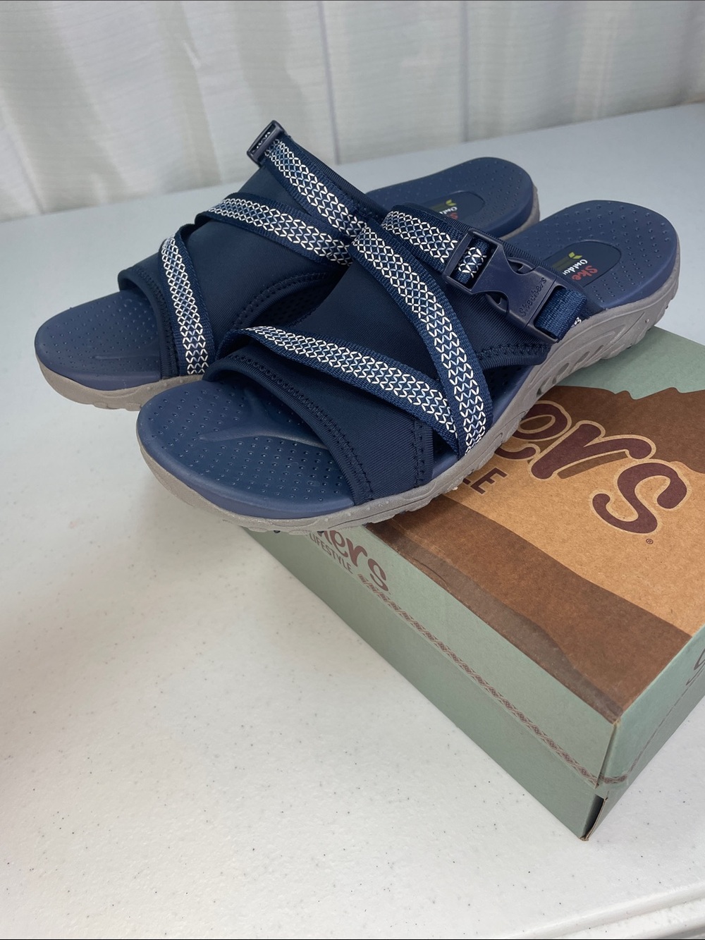 Skechers women’s Navy and White Slip-On Sport Sandals - Picture 7 of 9